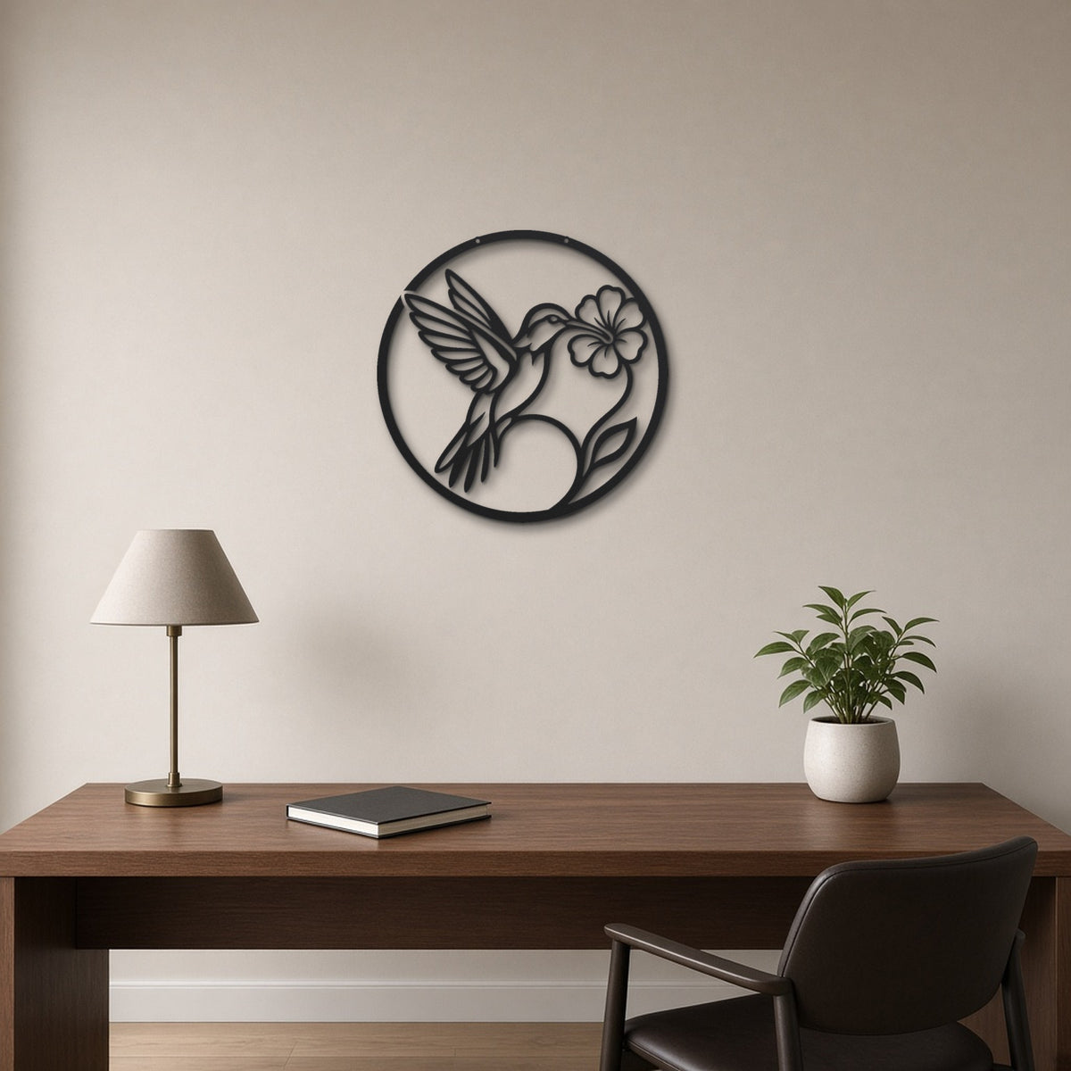 Line Art Hummingbird black metal wall art hanging on a home office wall