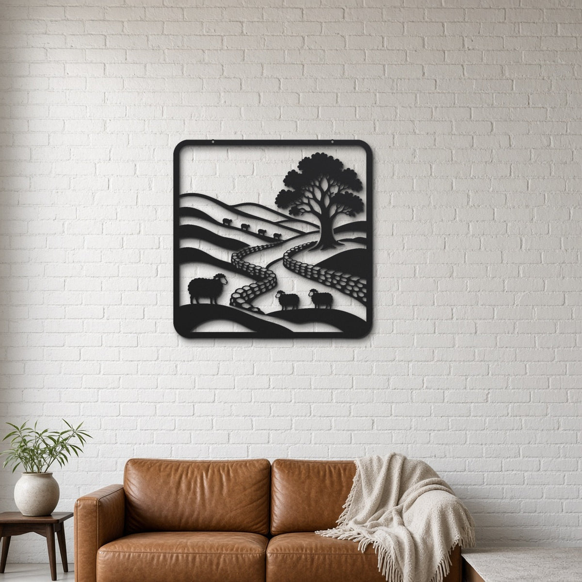 Peak District Hills black metal wall art hanging on a lounge with white brick wall wall