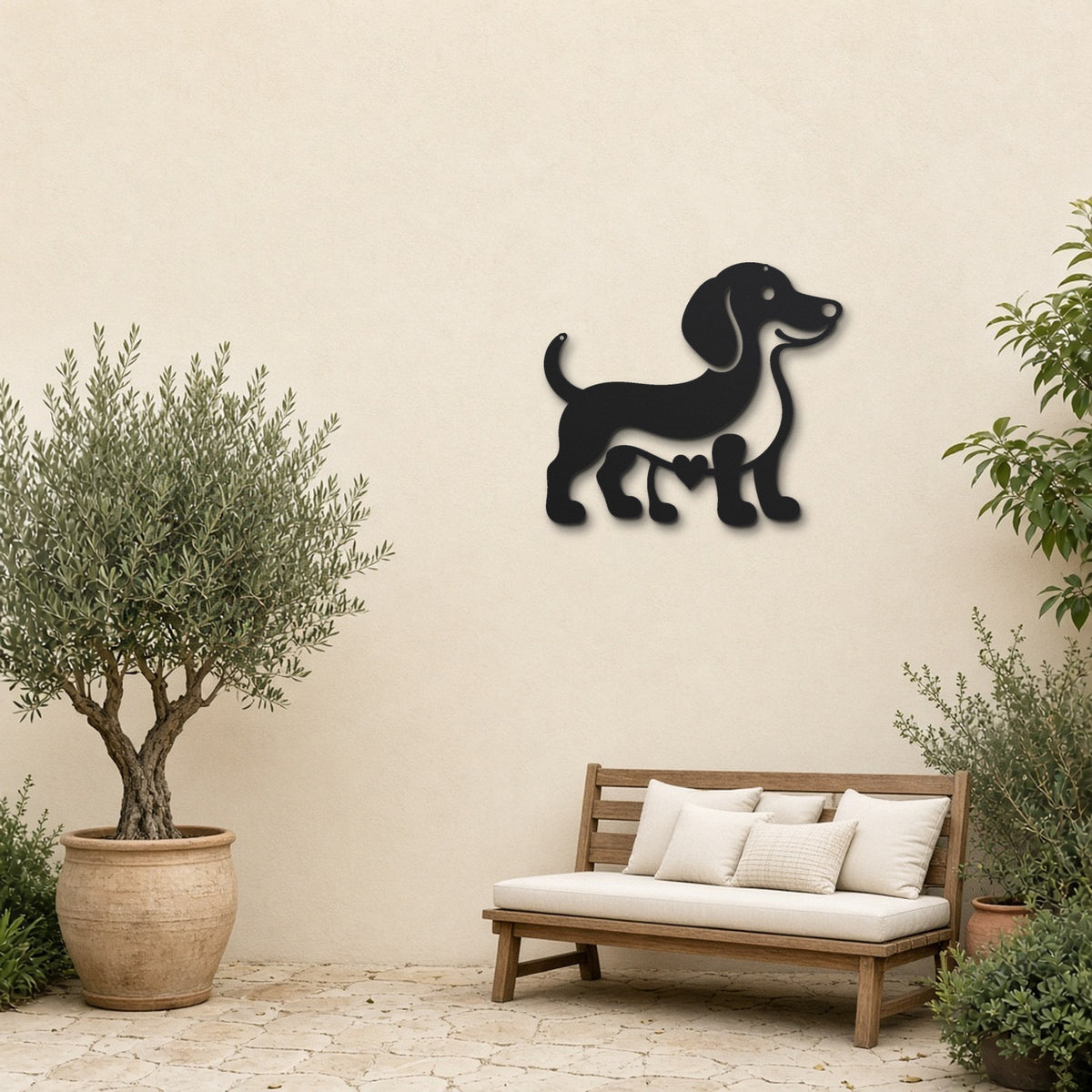 Dachshund black metal wall art hanging on a garden patio wall