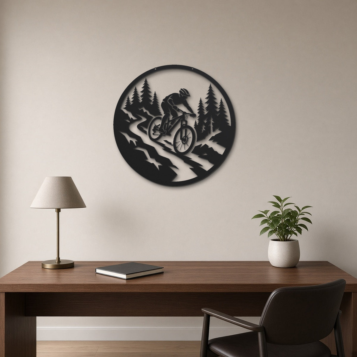 Mountain Biker black metal wall art hanging on a home office wall