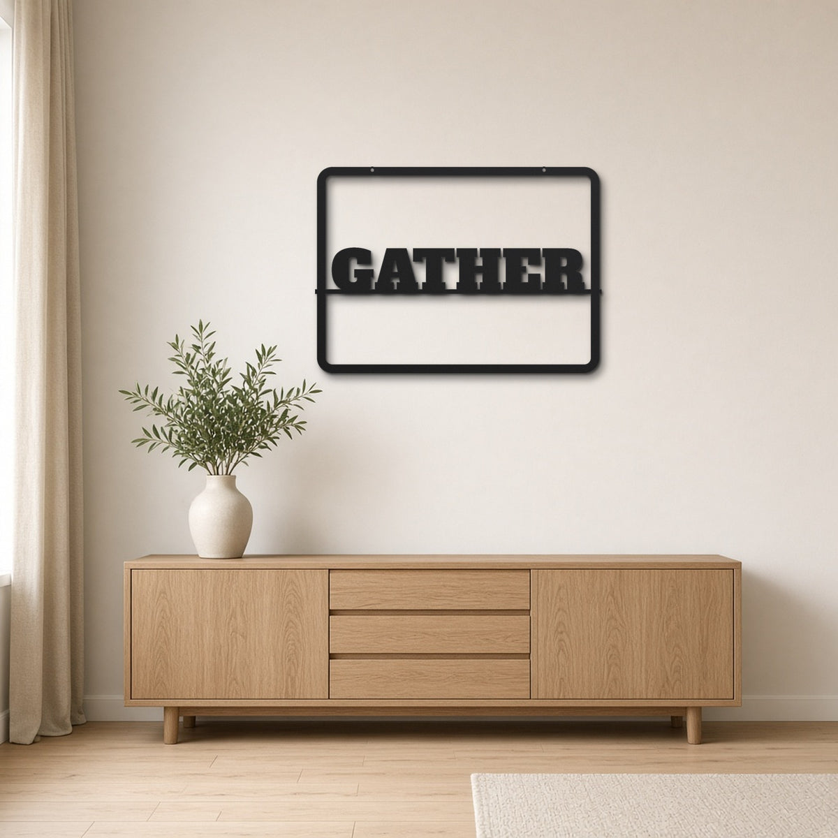 Gather black metal wall art hanging on a Scandinavian living room wall