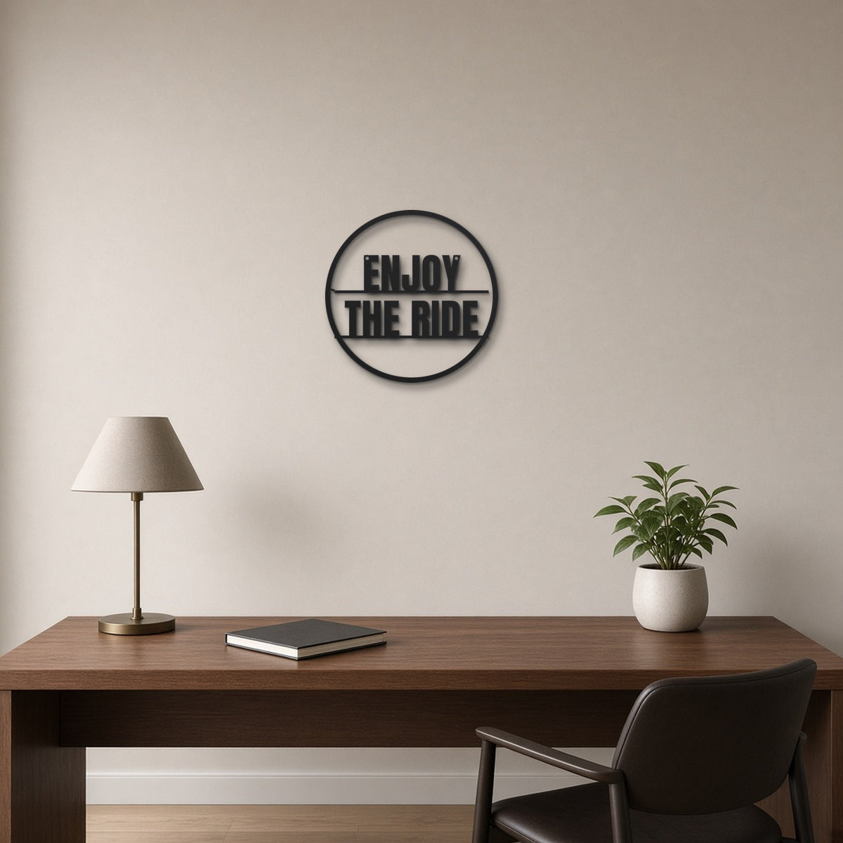 Enjoy The Ride black metal wall art hanging on a home office wall