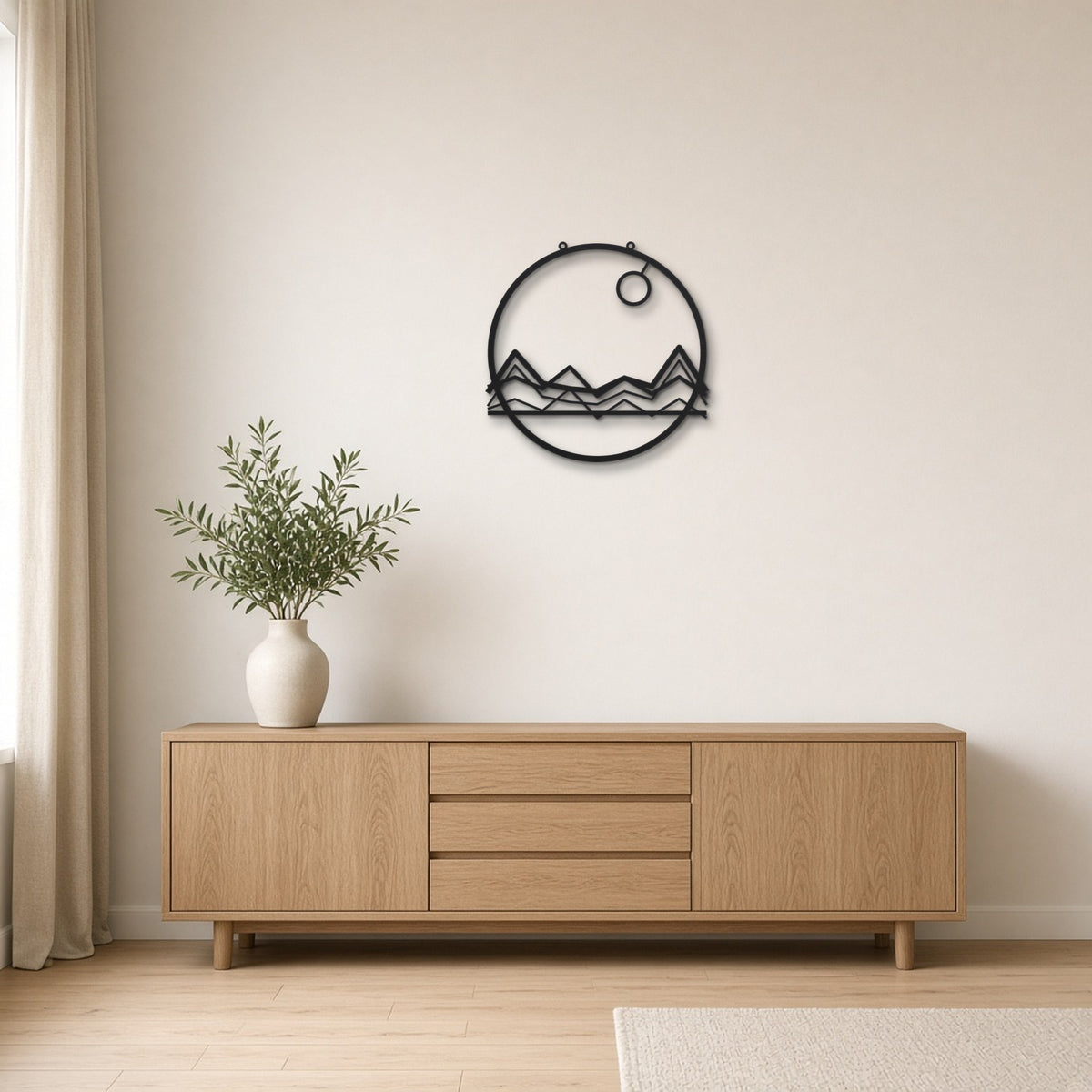 Minimal Mountains black metal wall art hanging on a Scandinavian living room wall